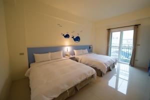 Phòng Deluxe 4 Người (Deluxe Quadruple Room)