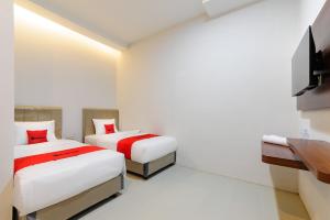 Phòng Hai Giường Đơn Loại Sang (Deluxe Twin Room)