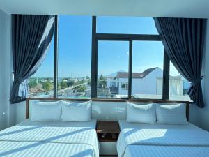 Phòng Deluxe Có 2 Giường Cỡ Queen (Deluxe Queen Room with Two Queen Beds)