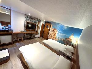 Phòng Tiêu chuẩn 2 Giường Đơn - không có cửa sổ (Standard Twin Room - no window)