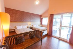 Phòng Tiêu Chuẩn Cho 4 Người Hướng Vườn (Standard Quadruple Garden view)