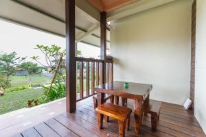 Phòng Tiêu Chuẩn Cho 4 Người Hướng Vườn (Standard Quadruple Garden view)