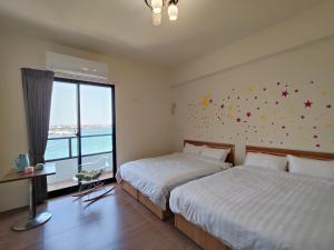 Phòng 4 Người Nhìn Ra Biển (Quadruple Room with Sea View)