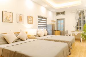 Phòng Tiêu Chuẩn Có 2 Giường Cỡ Queen (Standard Queen Room with Two Queen Beds)