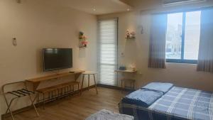 Phòng 4 Người Có Ban Công (Quadruple Room with Balcony)
