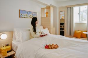 Phòng Deluxe Giường Đôi Nhìn Ra Thành Phố (Deluxe Double Room with City View)
