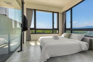 Phòng Giường Đôi Lớn Loại Sang (Deluxe Queen Room)