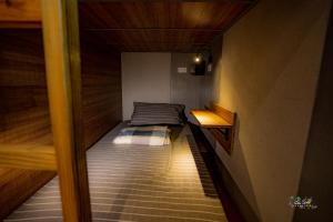 Giường Trong Phòng Nghỉ Tập Thể 8 Giường Cho Cả Nam Và Nữ (Bed in 8-Bed Mixed Dormitory Room)