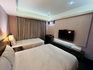 Tiêu Chuẩn 3 Người - 1 Giường Đôi Và 1 Giường Đơn, Cấm Hút Thuốc (Standard Triple - 1 Double Bed and 1 Single Bed, Non-Smoking)