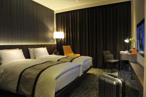 Phòng Hai Giường Đơn Loại Sang (Deluxe Twin Room)