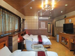 Phòng Deluxe 4 Người (Deluxe Quadruple Room)