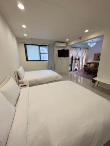 Phòng Loại Sang Bốn Người Có Sân Hiên (Deluxe Quadruple Room with Terrace)