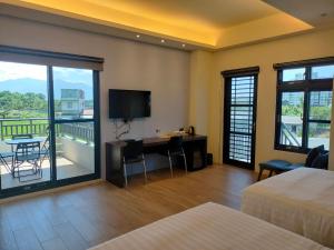 Phòng 4 người nhìn ra vườn (Quadruple Room with Garden View)