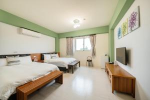 Phòng 4 người Nhìn ra cảnh Núi non (Quadruple Room with Mountain View)
