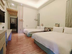 Suite Gia Đình Có Ban Công (Family Suite with Balcony)