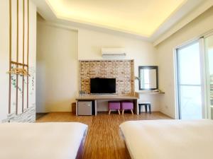 Phòng 4 Người Có Ban Công (Quadruple Room with Balcony)