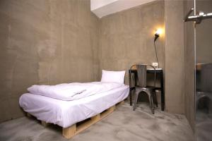 Phòng Đơn Comfort với Phòng tắm Chung (Comfort Single Room with Shared Bathroom)