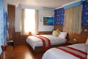 Phòng Bốn Người Có Phòng Tắm Riêng (Quadruple Room with Private Bathroom)