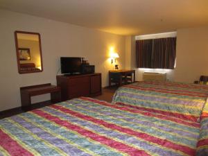 Queen Room with Two Queen Beds room in Hospitality Inn