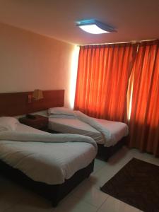 Comfort Twin Room room in Zaina Plaza Hotel