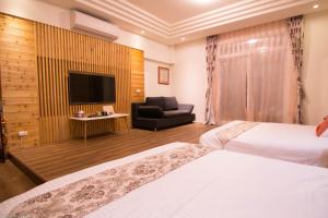 Phòng Deluxe Gia đình có Ban công (Deluxe Family Room with Balcony)