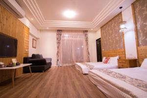 Phòng Deluxe Gia đình có Ban công (Deluxe Family Room with Balcony)