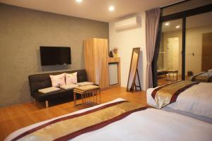Phòng Deluxe 4 Người (Deluxe Quadruple Room)