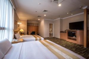 Phòng Deluxe 4 Người (Deluxe Quadruple Room)