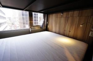 Giường đôi trong Phòng nghỉ tập thể cho cả Nam và Nữ (Double Bed in Mixed Dormitory )