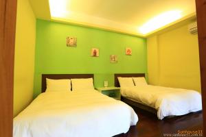 Phòng 4 người nhìn ra vườn (Quadruple Room with Garden View)