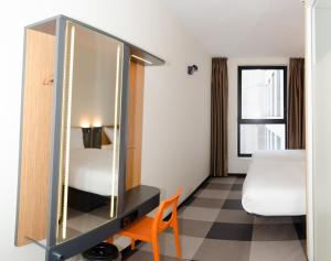 Family triple room room in easyHotel Brussels City Centre