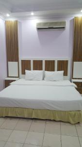 Three-Bedroom Apartment room in Burj Al Hayat Furnished suites-Al Mallaz