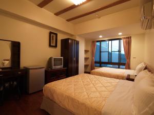 Phòng Tiêu Chuẩn 4 Người (Standard Quadruple Room)