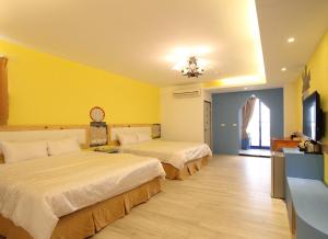 Phòng Deluxe Có 2 Giường Cỡ Queen (Deluxe Queen Room with Two Queen Beds)