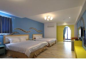 Phòng Deluxe Có 2 Giường Cỡ Queen (Deluxe Queen Room with Two Queen Beds)