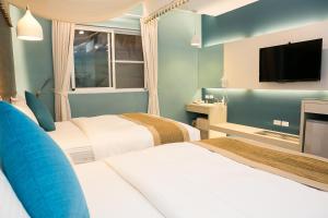 Phòng Deluxe 4 Người (Deluxe Quadruple Room)