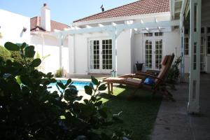 Three Bedroom Apartment with Pool View  room in 5 Camp Street Guesthouse & Self-catering