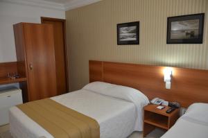 Deluxe Triple Room room in Arituba Park Hotel