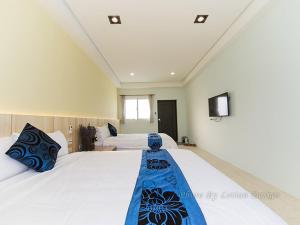 Phòng Bốn Người Có Phòng Tắm Riêng (Quadruple Room with Private Bathroom)