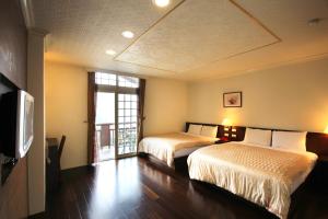 Phòng 4 người Nhìn ra cảnh Núi non (Quadruple Room with Mountain View)