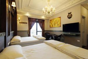 Phòng Deluxe 4 Người (Deluxe Quadruple Room)