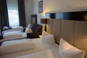 Quadruple Room room in Goethe Hotel Messe by Trip Inn