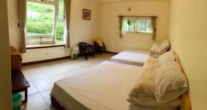 Phòng Tiêu Chuẩn 4 Người (Standard Quadruple Room)