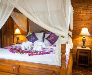 Phòng Premium có Giường cỡ King và Tầm nhìn ra Khu vườn (Premium King Room with Garden View)