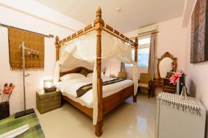 Phòng Giường Đôi Lớn Loại Sang (Deluxe Queen Room)