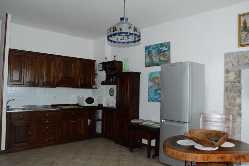 Kitchen, Maison Huguette in Civitavecchia Kitchen, Maison Huguette in Civitavecchia