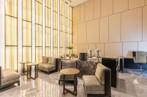 Shared lounge/TV area, I'M Hotel in Manila Shared lounge/TV area, I'M Hotel in Manila