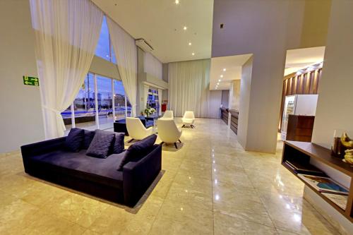 Shared lounge/TV area, Select Hotel in Palmas Shared lounge/TV area, Select Hotel in Palmas