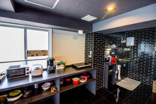 kuchnia, Santiago Guesthouse Hiroshima in Hiroszima kuchnia, Santiago Guesthouse Hiroshima in Hiroszima