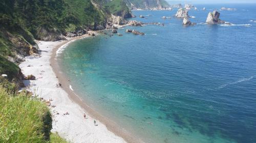 Strand, Mar del Norte in Ovinana Strand, Mar del Norte in Ovinana